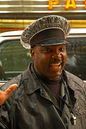 Happy_doorman_in_rain